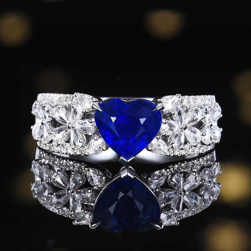 14k Gold 2.04 Ctw Natural Sapphire & Diamond Ring: Ref:231115079 // gold content:14k gold // ring size:7. 25us // // main gemstone:sapphire // shape:heart // carat weight:1. 59ct // color:royal blue // treatment:natural // // adjacent gemstone 2 :