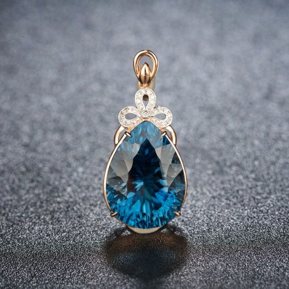 14k Gold 17.35 Ct Natural Topaz & Diamond Pendant( Without Chain ): Ref:231115102 // gold content:14k gold // main gemstone:topaz // shape:pear // carat weight:17. 35ct // color:blue // treatment:natural // // adjacent gemstone 2 : diamond // shape:round // clarity gr