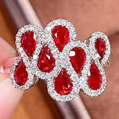14k Gold 1.8 Ct Vivid Red Natural Ruby & Diamond Ring: Ref:231115127 // gold content:14k gold // ring size:7. 25us // // main gemstone:ruby // shape:pear // carat weight:1. 8ct // color:vivid red // treatment:natural // // adjacent gemstone 2 : diamond //