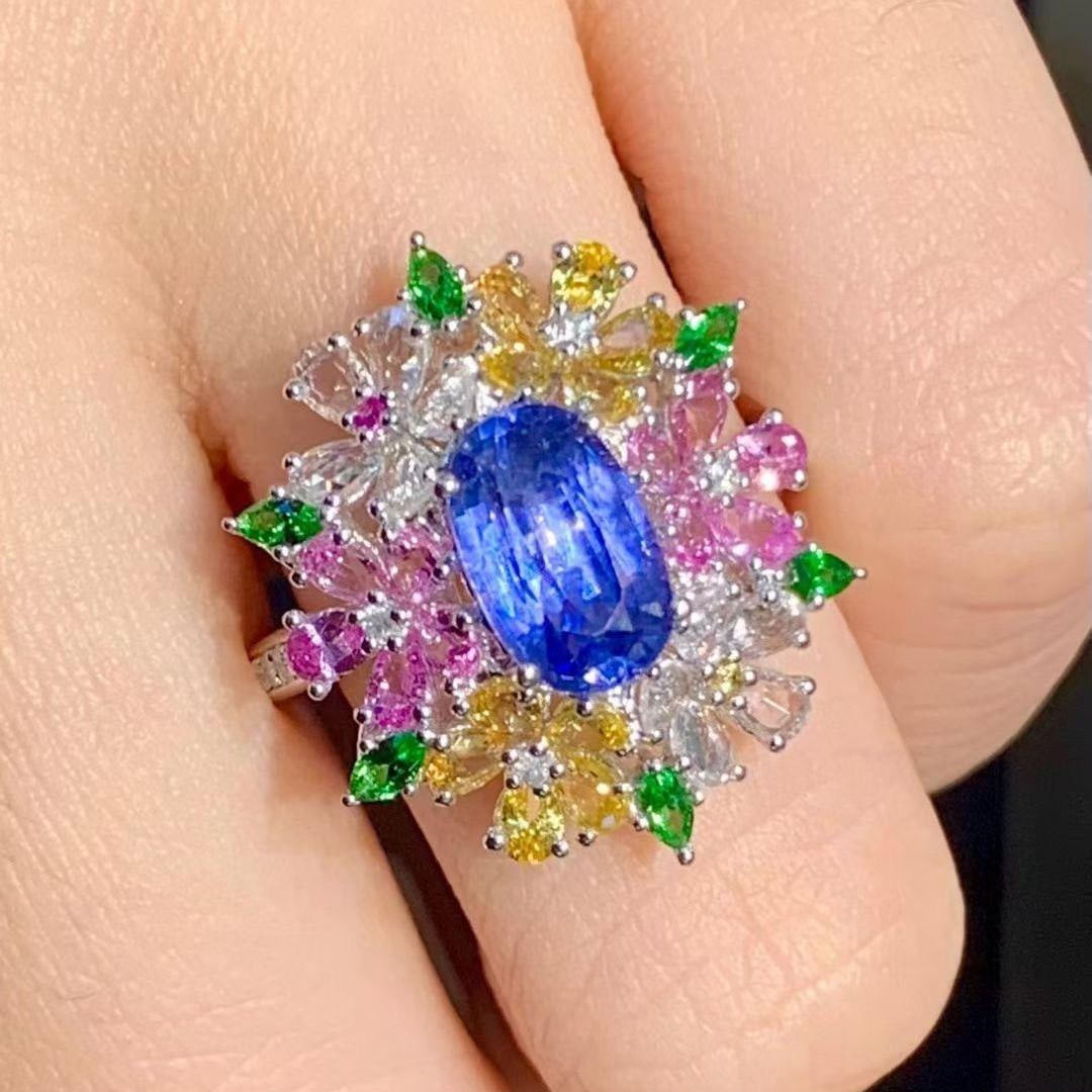 14k Gold 2 Ct Natural Sapphire & Diamond Ring: Ref:231115128 // gold content:14k gold // ring size:7. 25us // // main gemstone:sapphire // shape:oval // carat weight:2ct // color:blue // treatment:natural // // adjacent gemstone 2 : diamond //