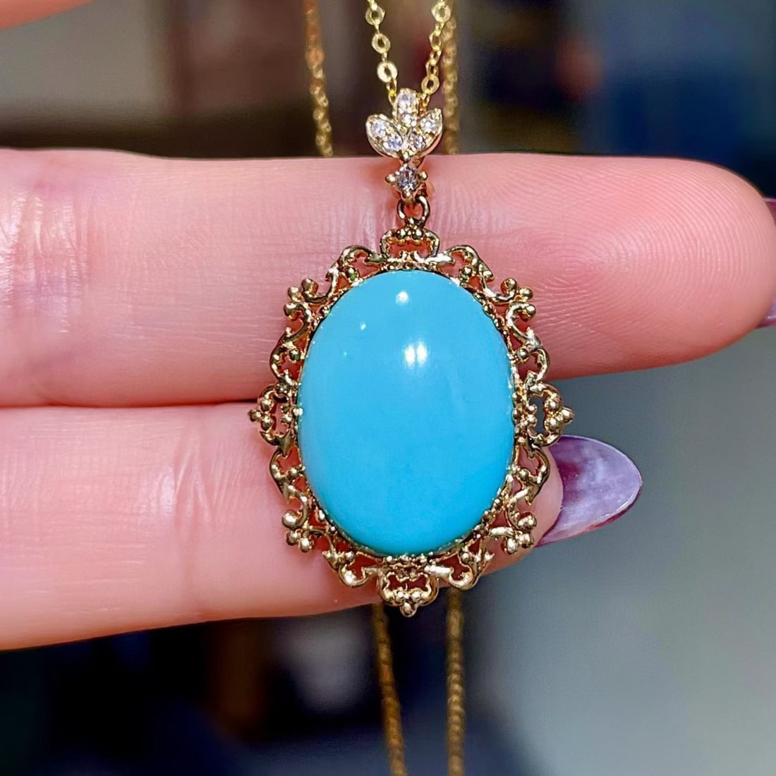 14k Gold 6.29 Ctw Natural Blue Turquoise & Diamond Pendant( Without Chain ): Ref:231115162 // gold content:14k gold // main gemstone:blue turquoise // shape:oval // carat weight:6. 25ct // color:blue // treatment:natural // // adjacent gemstone 2 : diamond // shape:round //