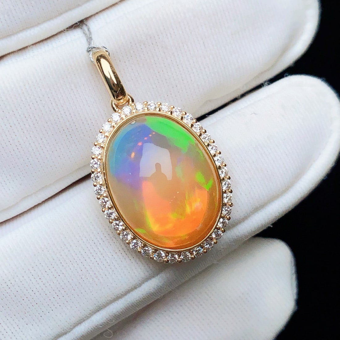 14k Gold 4.63 Ctw Natural Opal & Diamond Pendant( Without Chain ): Ref:231115170 // gold content:14k gold // main gemstone:opal // shape:oval // carat weight:4. 36ct // color:color // treatment:natural // // adjacent gemstone 2 : diamond // shape:round // carat weigh