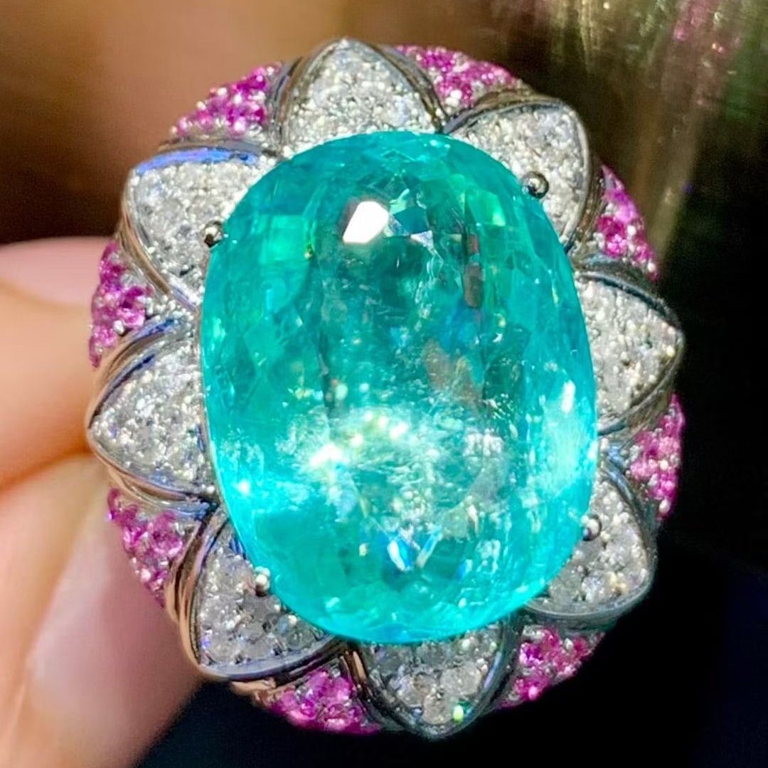 14k Gold 11.39 Ct Natural Paraiba Tourmaline & Diamond Ring: Ref:231115213 // gold content:14k gold // ring size:7. 25us // // main gemstone:paraiba tourmaline // shape:oval // carat weight:11. 39ct // color:blue // treatment:natural // // adjacent gemstone 2 :