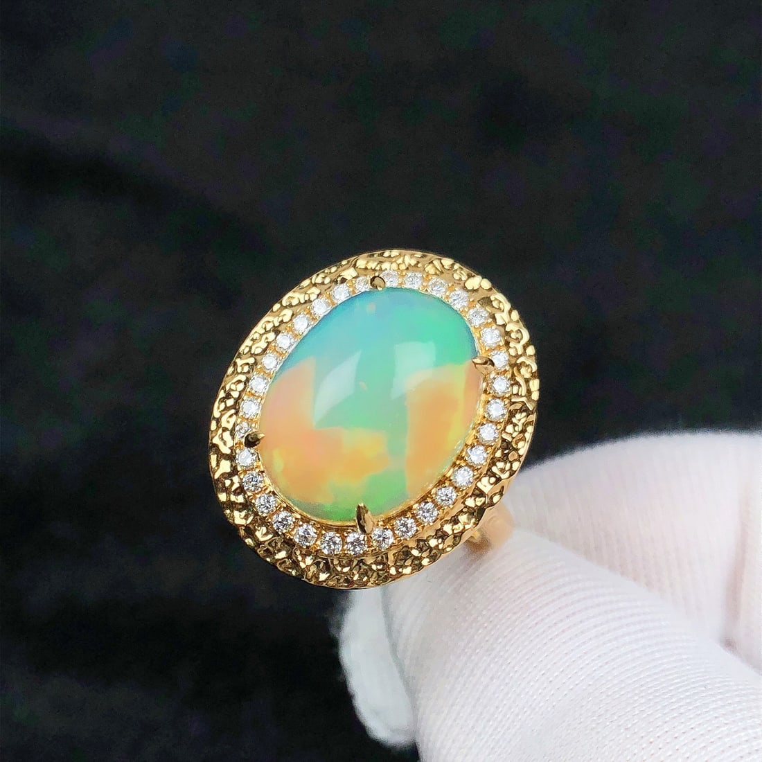 14k Gold 5.03 Ctw Natural Opal & Diamond Ring: Ref:231116040 // gold content:14k gold // ring size:7. 25us // // main gemstone:opal // shape:oval // carat weight:4. 78ct // color:color // treatment:natural // // adjacent gemstone 2 : diamond