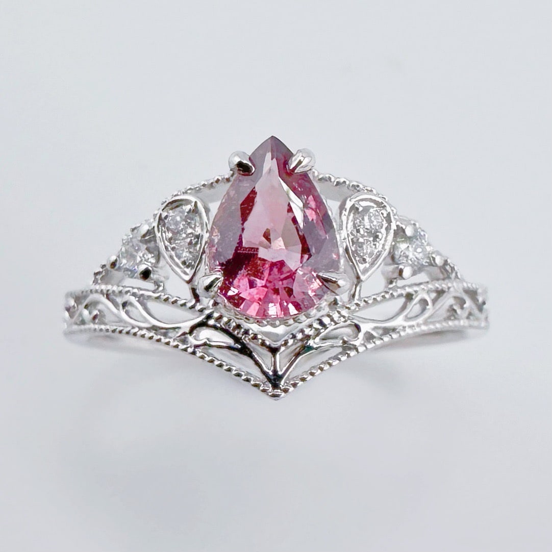 14k Gold 0.85 Ctw Natural Padparadscha Sapphire & Diamond Ring: Ref:231116049 // gold content:14k gold // ring size:7. 25us // // main gemstone:padparadscha sapphire // shape:pear // carat weight:0. 77ct // color:orangish pink // treatment:natural // //