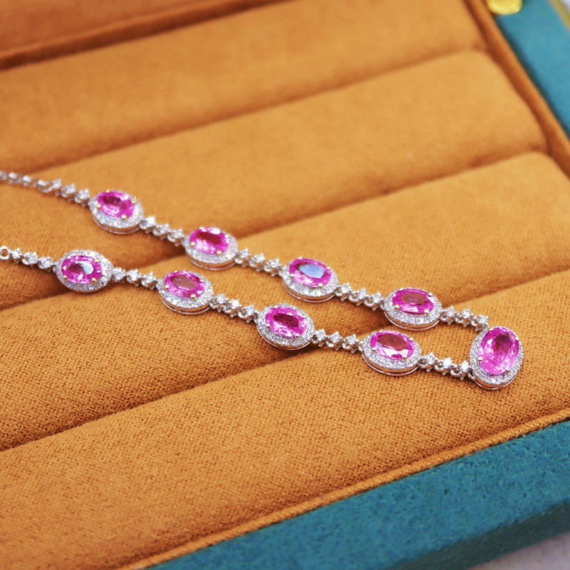 14k Gold 6.23 Ctw Natural Padparadscha Sapphire & Diamond Necklace: Ref:231116222 // gold content:14k gold // main gemstone:padparadscha sapphire // shape:oval // carat weight:5. 35ct // color:orangish pink // treatment:natural // // adjacent gemstone 2 : diamond