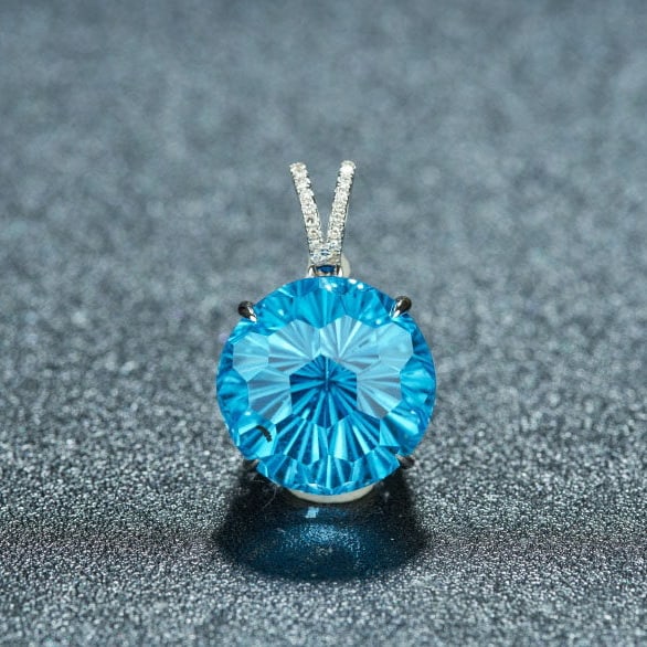 14k Gold 14.95 Ct Natural Topaz & Diamond Pendant( Without Chain ): Ref:231116242 // gold content:14k gold // main gemstone:topaz // shape:round // carat weight:14. 95ct // color:blue // treatment:natural // cut grade:g // // adjacent gemstone 2 : diamond // number of