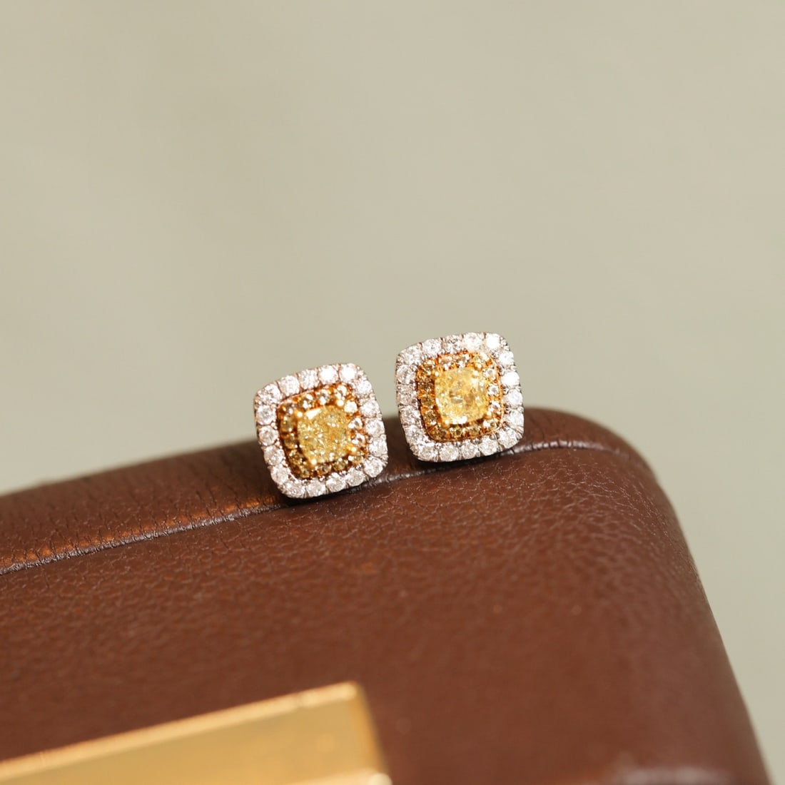 14k Gold 0.48 Ctw Natural Yellow Diamond & Diamond Earrings: Ref:231116330 // gold content:14k gold // main gemstone:yellow diamond // shape:cushion // carat weight:0. 3ct // color:yellow // treatment:natural // // adjacent gemstone 2 : diamond // shape:round /