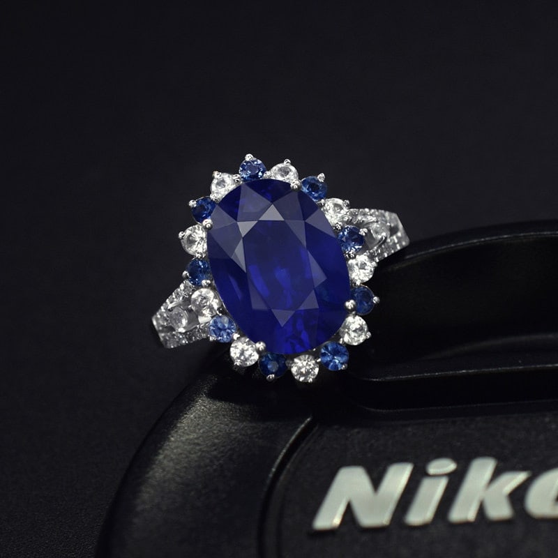 14k Gold 5.65 Ctw Natural Sapphire & Sapphire Ring: Ref:231107004 // gold content:14k gold // ring size:7. 25us // // main gemstone:sapphire // shape:oval // carat weight:5. 06ct // color:blue // treatment:natural // // adjacent gemstone 2 :