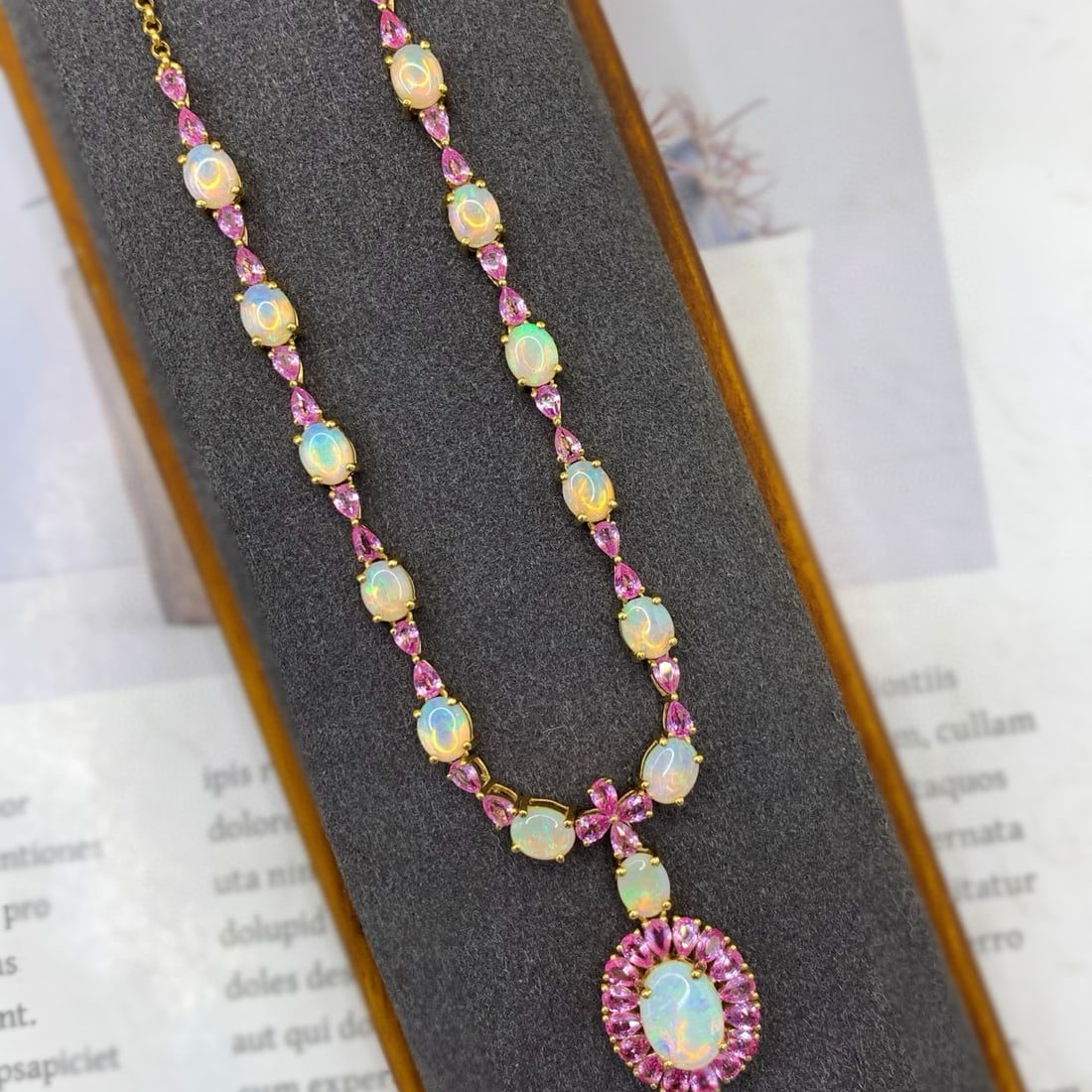 14k Gold 6.45 Ctw Natural Opal & Sapphire Necklace: Ref:231107034 // gold content:14k gold // main gemstone:opal // shape:oval // carat weight:3. 3ct // color:color // treatment:natural // // adjacent gemstone 2 : sapphire // number of stones:44 // sha