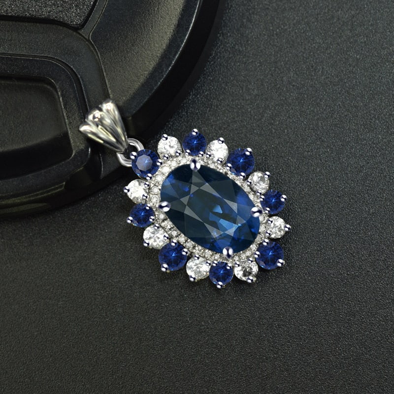 14k Gold 4.32 Ctw Natural Sapphire & Sapphire Pendant( Without Chain ): Ref:231107064 // gold content:14k gold // main gemstone:sapphire // shape:oval // carat weight:3. 91ct // color:blue // treatment:natural // // adjacent gemstone 2 : sapphire // shape:round //