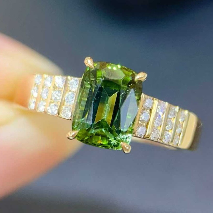 14k Gold 1.74 Ctw Natural Tourmaline & Diamond Ring: Ref:231108017 // gold content:14k gold // ring size:7. 25us // // main gemstone:tourmaline // shape:cushion // carat weight:1. 60ct // color:green // treatment:natural // // adjacent gemstone 2 :