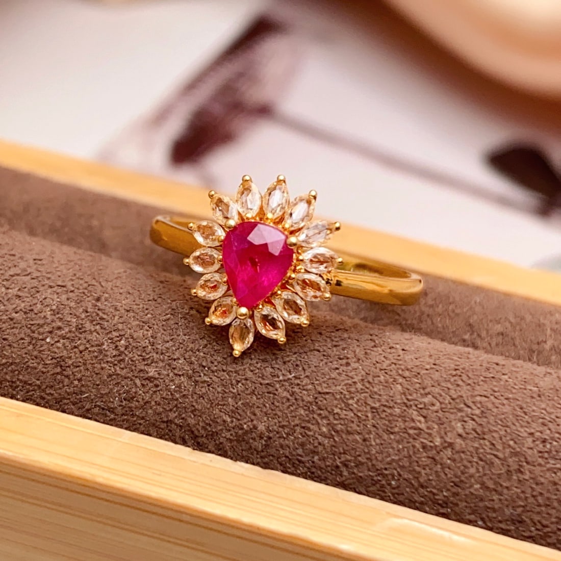 14k Gold 0.55 Ct Natural Ruby & Sapphire Ring: Ref:231108063 // gold content:14k gold // ring size:7. 25us // // main gemstone:ruby // shape:pear // carat weight:0. 55ct // color:red // treatment:natural // // adjacent gemstone 2 : sapphire //
