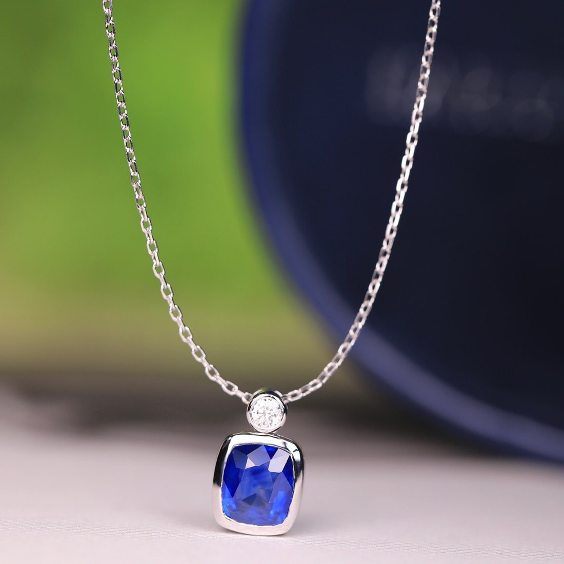 14k Gold 1.29 Ct Natural Sapphire & Diamond Necklace: Ref:231108090 // gold content:14k gold // main gemstone:sapphire // shape:cushion // carat weight:1. 29ct // color:royal blue // treatment:natural // // adjacent gemstone 2 : diamond // shape:round