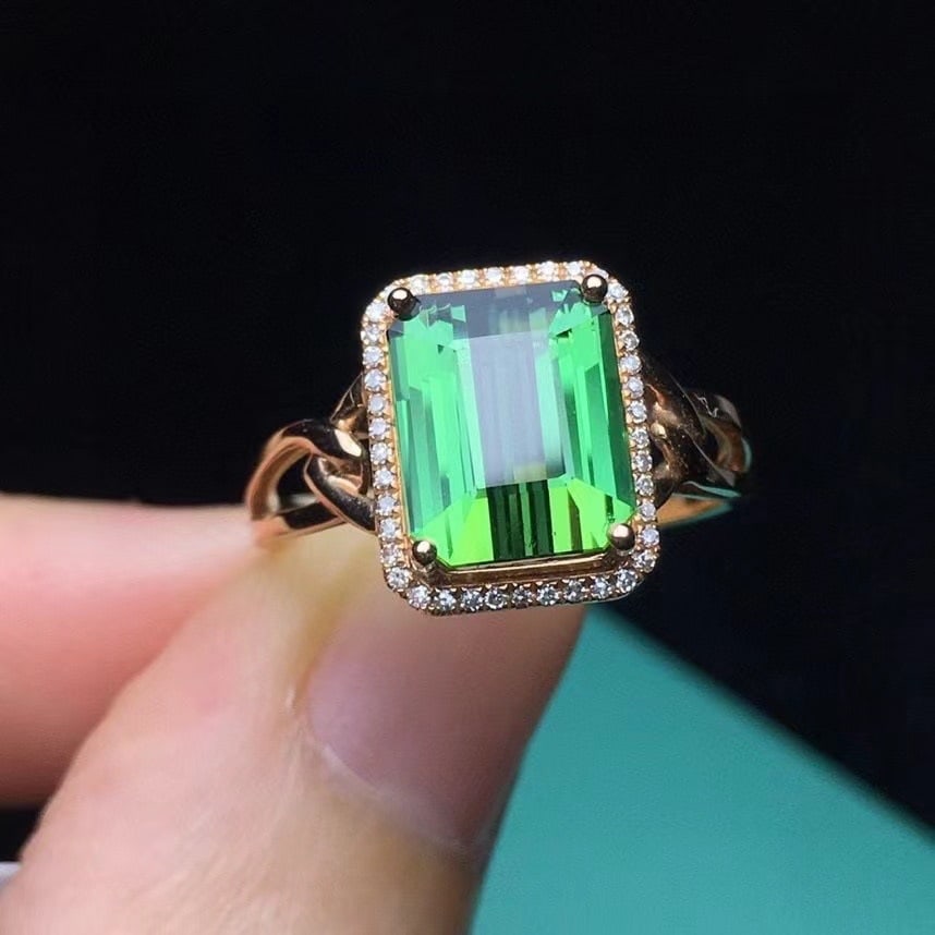 14k Gold 3.2 Ct Natural Tourmaline & Diamond Ring: Ref:231108306 // gold content:14k gold // ring size:7. 25us // // main gemstone:tourmaline // shape:octagonal // carat weight:3. 2ct // color:green // treatment:natural // // adjacent gemstone 2 : dia