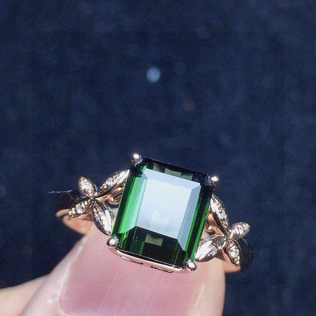 14k Gold 1.83 Ct Natural Tourmaline & Diamond Ring: Ref:231108345 // gold content:14k gold // ring size:7. 25us // // main gemstone:tourmaline // shape:octagonal // carat weight:1. 83ct // color:green // treatment:natural // // adjacent gemstone 2