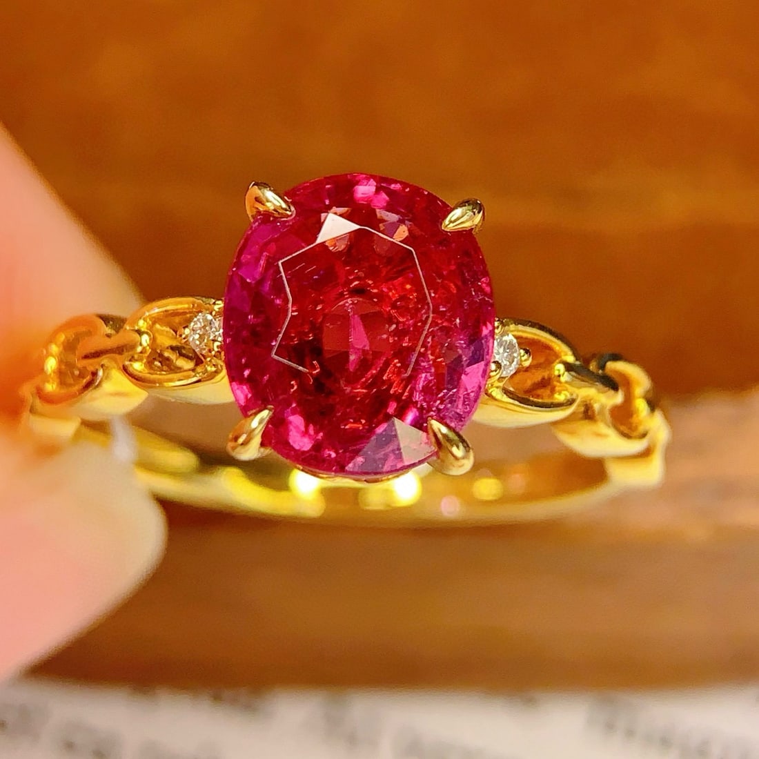 14k Gold 2.8 Ct Natural Tourmaline & Diamond Ring: Ref:231109219 // gold content:14k gold // ring size:7. 25us // // main gemstone:tourmaline // shape:oval // carat weight:2. 8ct // color:red // treatment:natural // // adjacent gemstone 2 :