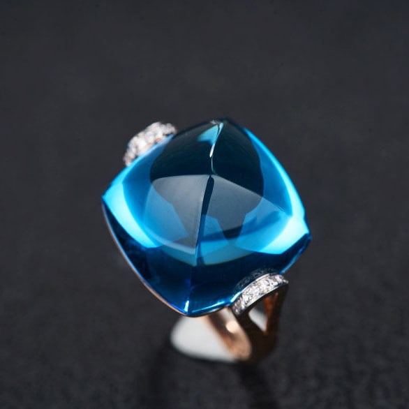 14k Gold 22.56 Ct Natural Topaz & Diamond Ring: Ref:231109250 // gold content:14k gold // ring size:7. 25us // // main gemstone:topaz // shape:sugar-loaf // carat weight:22. 56ct // color:blue // treatment:natural // // adjacent gemstone 2 : diamon