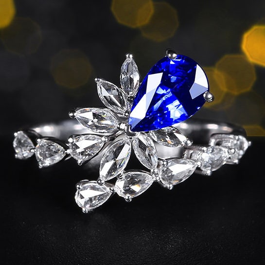 14k Gold 1.74 Ctw Natural Sapphire & Diamond Ring: Ref:231110008 // gold content:14k gold // ring size:7. 25us // // main gemstone:sapphire // shape:pear // carat weight:1. 29ct // color:royal blue // treatment:natural // // adjacent gemstone 2 :