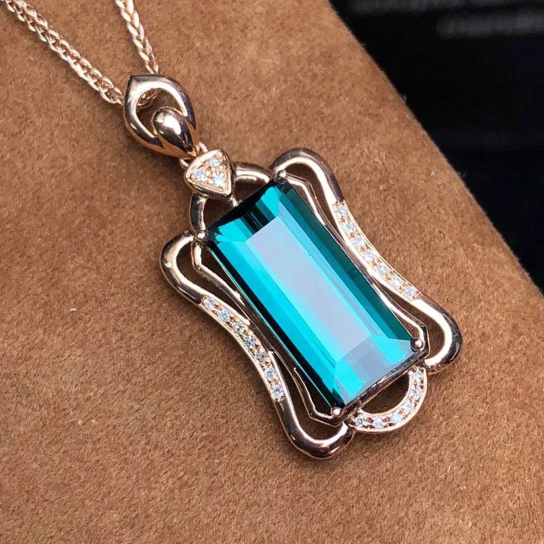 14k Gold 3.85 Ct Natural Tourmaline & Diamond Pendant( Without Chain ): Ref:231110022 // gold content:14k gold // main gemstone:tourmaline // shape:octagonal // carat weight:3. 85ct // color:blue // treatment:natural // // adjacent gemstone 2 : diamond // number of