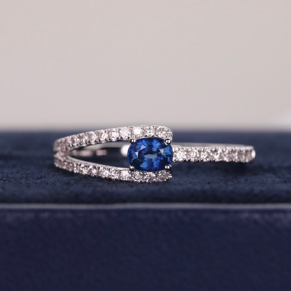 14k Gold 0.48 Ctw Natural Sapphire & Diamond Ring: Ref:231110056 // gold content:14k gold // ring size:7. 25us // // main gemstone:sapphire // shape:oval // carat weight:0. 27ct // color:blue // treatment:natural // // adjacent gemstone 2 :