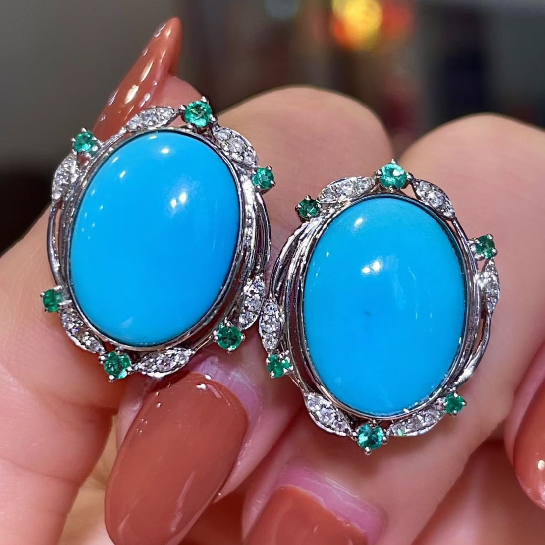 14k Gold 9.37 Ctw Natural Blue Turquoise & Emerald Earrings: Ref:231110134 // gold content:14k gold // main gemstone:blue turquoise // shape:oval // carat weight:9. 08ct // color:blue // treatment:natural // // adjacent gemstone 2 : emerald // shape:round // ca