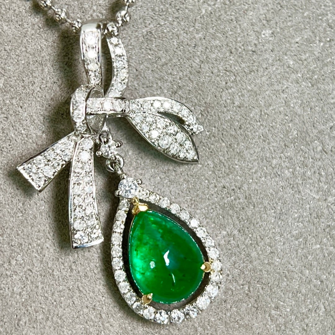 14k Gold 2.45 Ctw Vivid Green Natural Emerald & Diamond Pendant( Without Chain ): Ref:231110436 // gold content:14k gold // main gemstone:emerald // shape:pear // carat weight:1. 89ct // color:vivid green // treatment:natural // // adjacent gemstone 2 : diamond // shape:round //