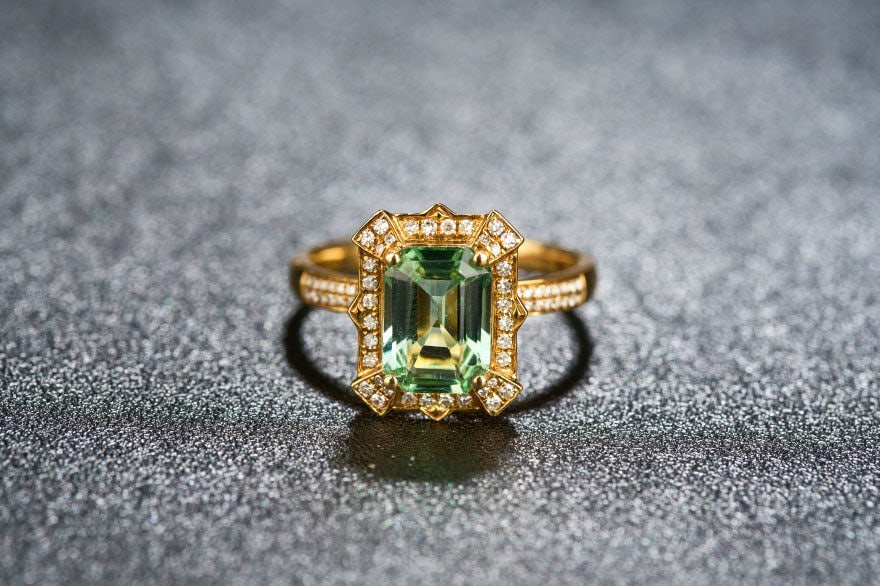 14k Gold 2.4 Ctw Natural Tourmaline & Diamond Ring: Ref:231111096 // gold content:14k gold // ring size:7. 25us // // main gemstone:tourmaline // shape:octagonal // carat weight:2. 0ct // color:green // treatment:natural // // adjacent gemstone 2 :