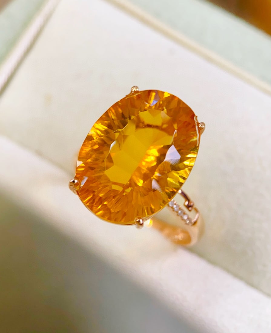 14k Gold 10.58 Ctw Natural Citrine & Diamond Ring: Ref:231111104 // gold content:14k gold // ring size:7. 25us // // main gemstone:citrine // shape:oval // carat weight:10. 55ct // color:yellow // treatment:natural // // adjacent gemstone 2 :