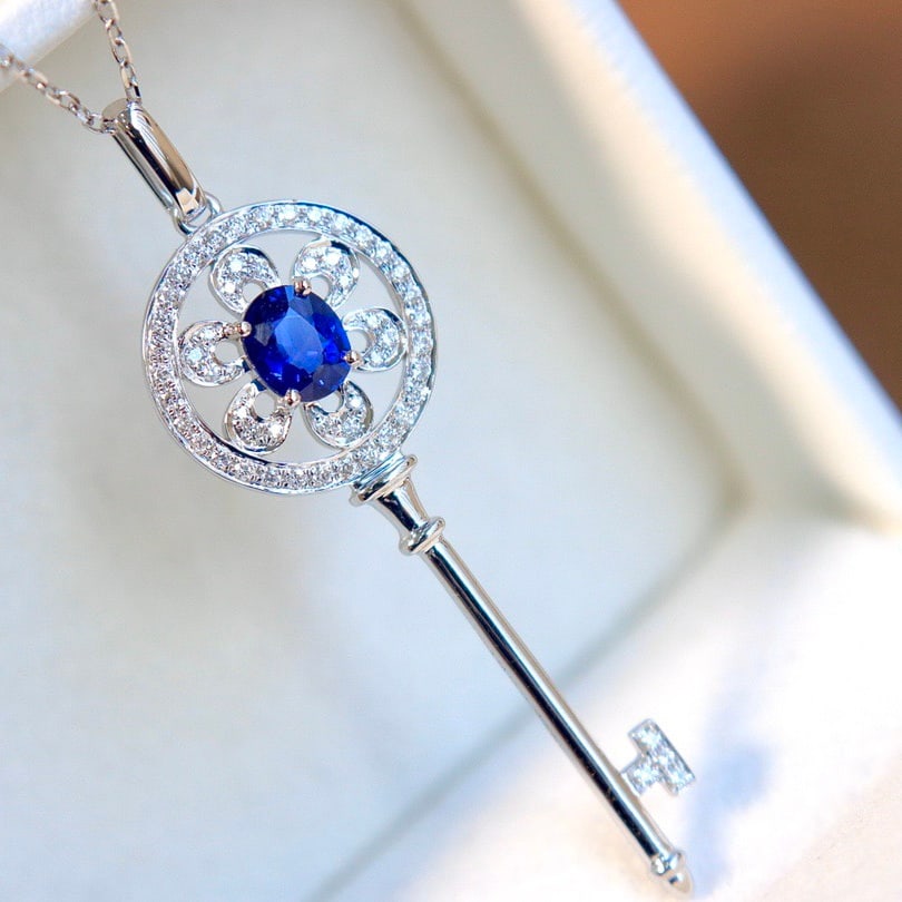 14k Gold 0.69 Ctw Natural Sapphire & Diamond Pendant( Without Chain ): Ref:231112075 // gold content:14k gold // main gemstone:sapphire // shape:oval // carat weight:0. 5ct // color:royal blue // treatment:natural // // adjacent gemstone 2 : diamond // shape:round //