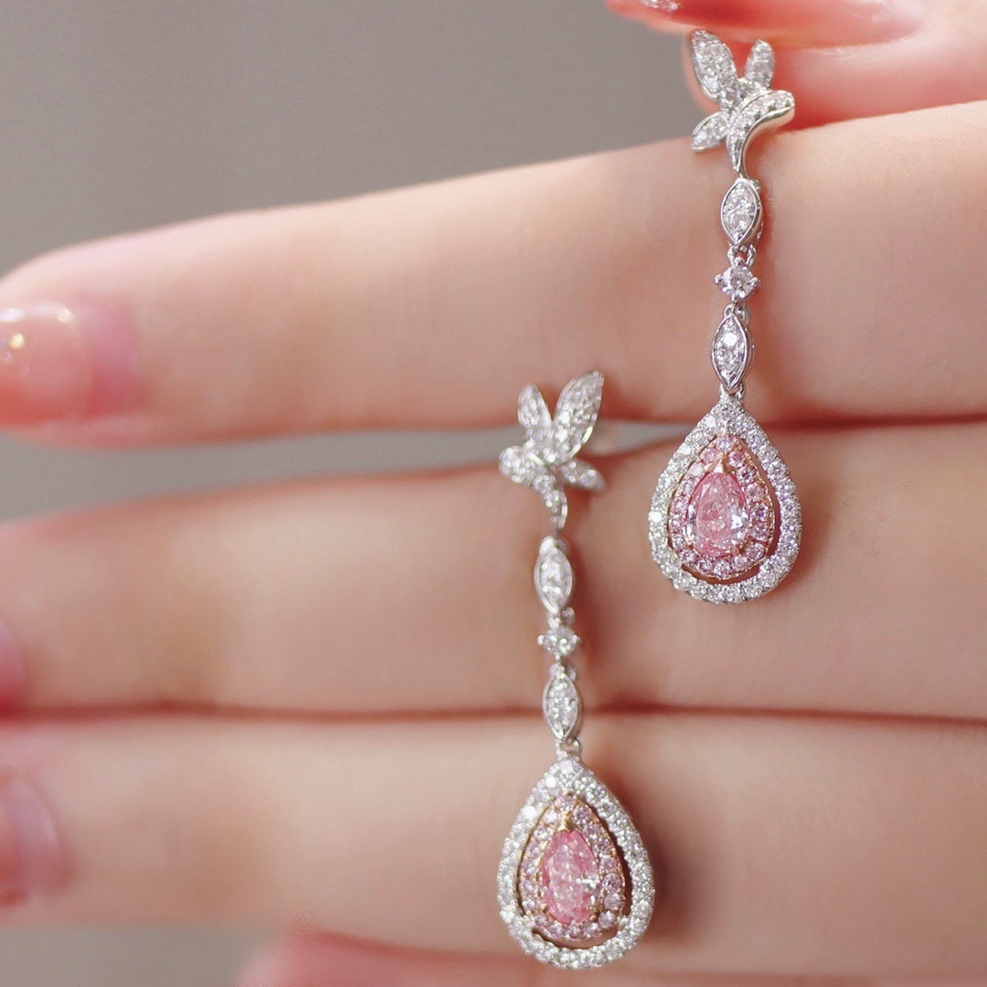 14k Gold 1.32 Ctw Natural Pink Diamond & Diamond Earrings: Ref:231112149 // gold content:14k gold // main gemstone:pink diamond // shape:pear // carat weight:0. 65ct // color:pink // treatment:natural // // adjacent gemstone 2 : diamond // shape:round //