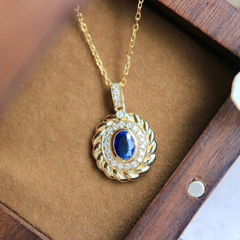 14k Gold 0.5 Ct Natural Sapphire & Diamond Pendant( Without Chain ): Ref:231112189 // gold content:14k gold // main gemstone:sapphire // shape:oval // carat weight:0. 5ct // color:blue // treatment:natural // // adjacent gemstone 2 : diamond // shape:round //