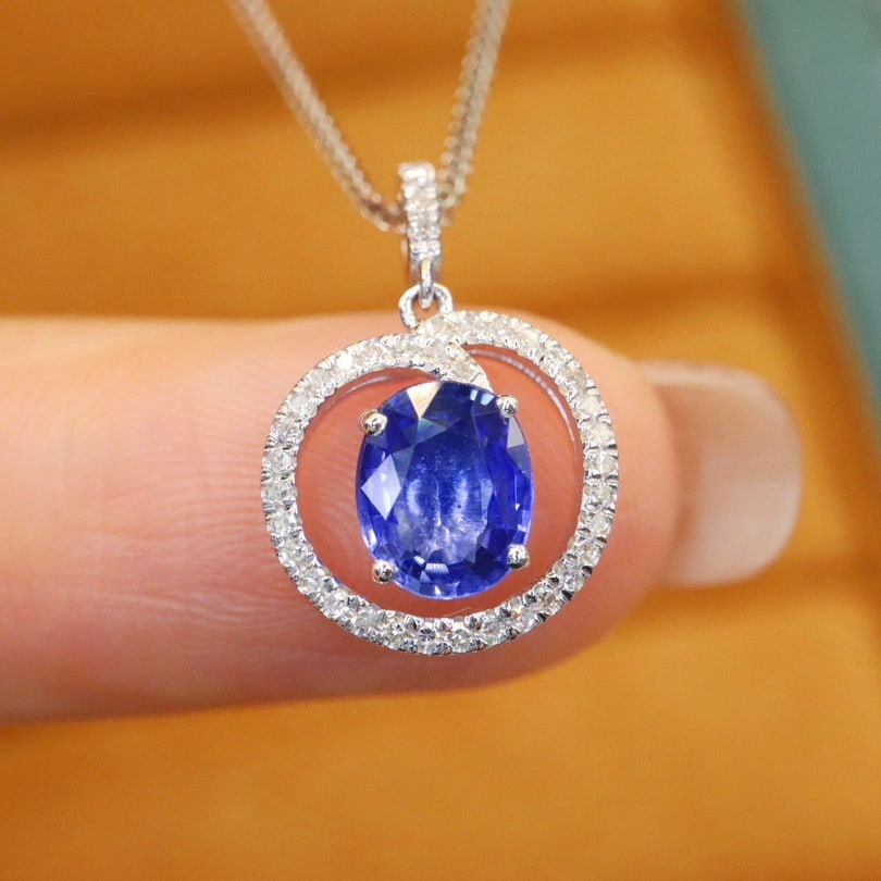 14k Gold 1.10 Ctw Natural Sapphire & Diamond Pendant( Without Chain ): Ref:231112378 // gold content:14k gold // main gemstone:sapphire // shape:oval // carat weight:0. 98ct // color:cornflower blue // treatment:natural // // adjacent gemstone 2 : diamond // number of st