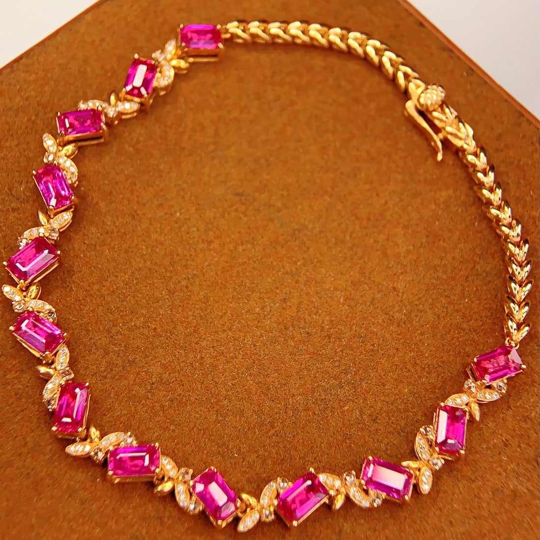 14k Gold 7.16 Ct Natural Ruby & Diamond & Sapphire Bracelet: Ref:231112445 // gold content:14k gold // main gemstone:ruby // shape:octagonal // carat weight:7. 16ct // color:red // treatment:natural // // adjacent gemstone 2 : diamond // number of stones:72 //