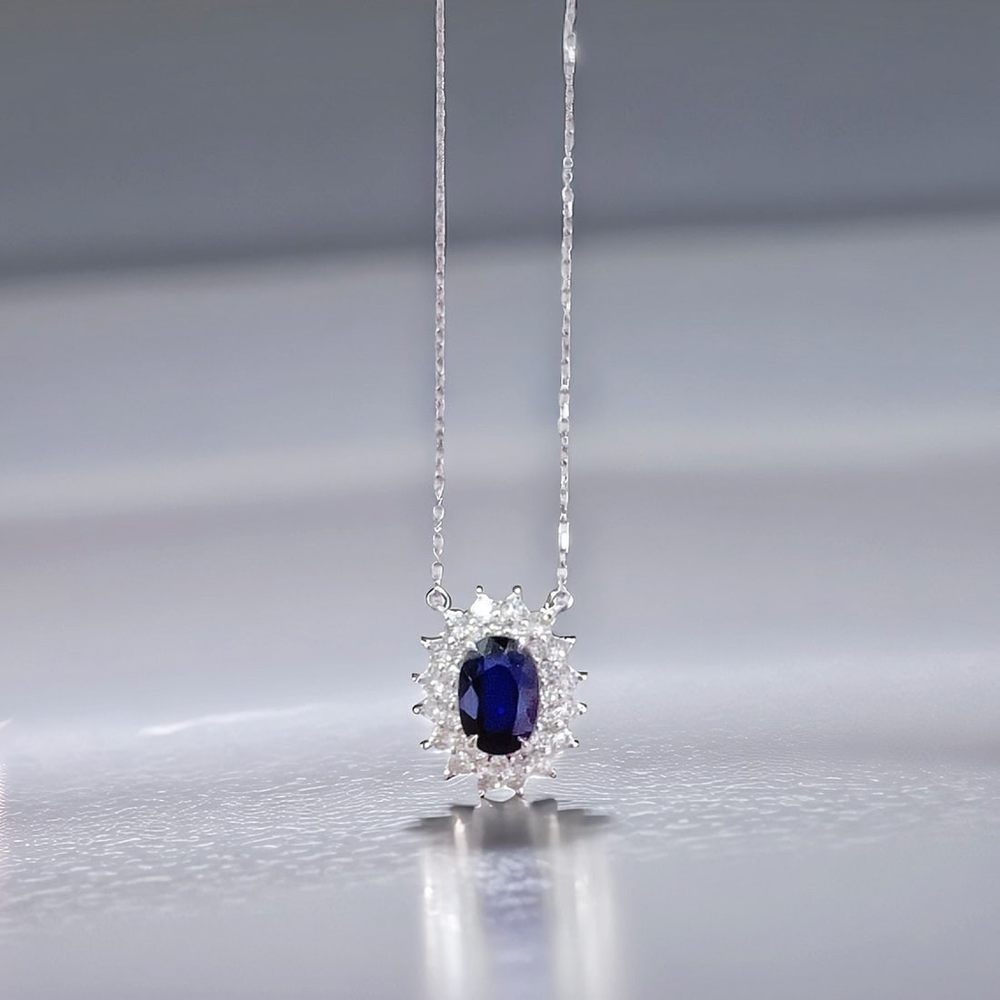 Express Shipping 18k Gold 0.98 Ctw Natural Sapphire & Diamond Necklace: Ref:21057 // gold content:18k gold // main gemstone:sapphire // shape:oval // carat weight:0. 65ct // color:blue // treatment:natural // // adjacent gemstone 2 : diamond // shape:round // carat