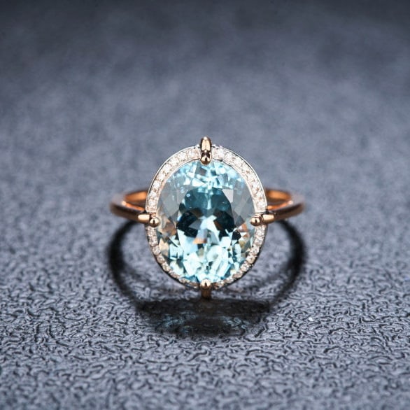 14k Gold 5.0 Ct Natural Aquamarine & Diamond Ring: Ref:231119118 // gold content:14k gold // ring size:7. 25us // // main gemstone:aquamarine // shape:oval // carat weight:5. 0ct // color:santa maria color // treatment:natural // // adjacent
