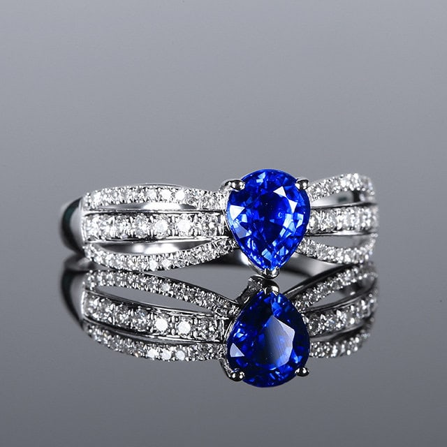 14k Gold 1.34 Ctw Natural Sapphire & Diamond Ring: Ref:231119132 // gold content:14k gold // ring size:7. 25us // // main gemstone:sapphire // shape:pear // carat weight:1. 06ct // color:blue // treatment:natural // // adjacent gemstone 2 :