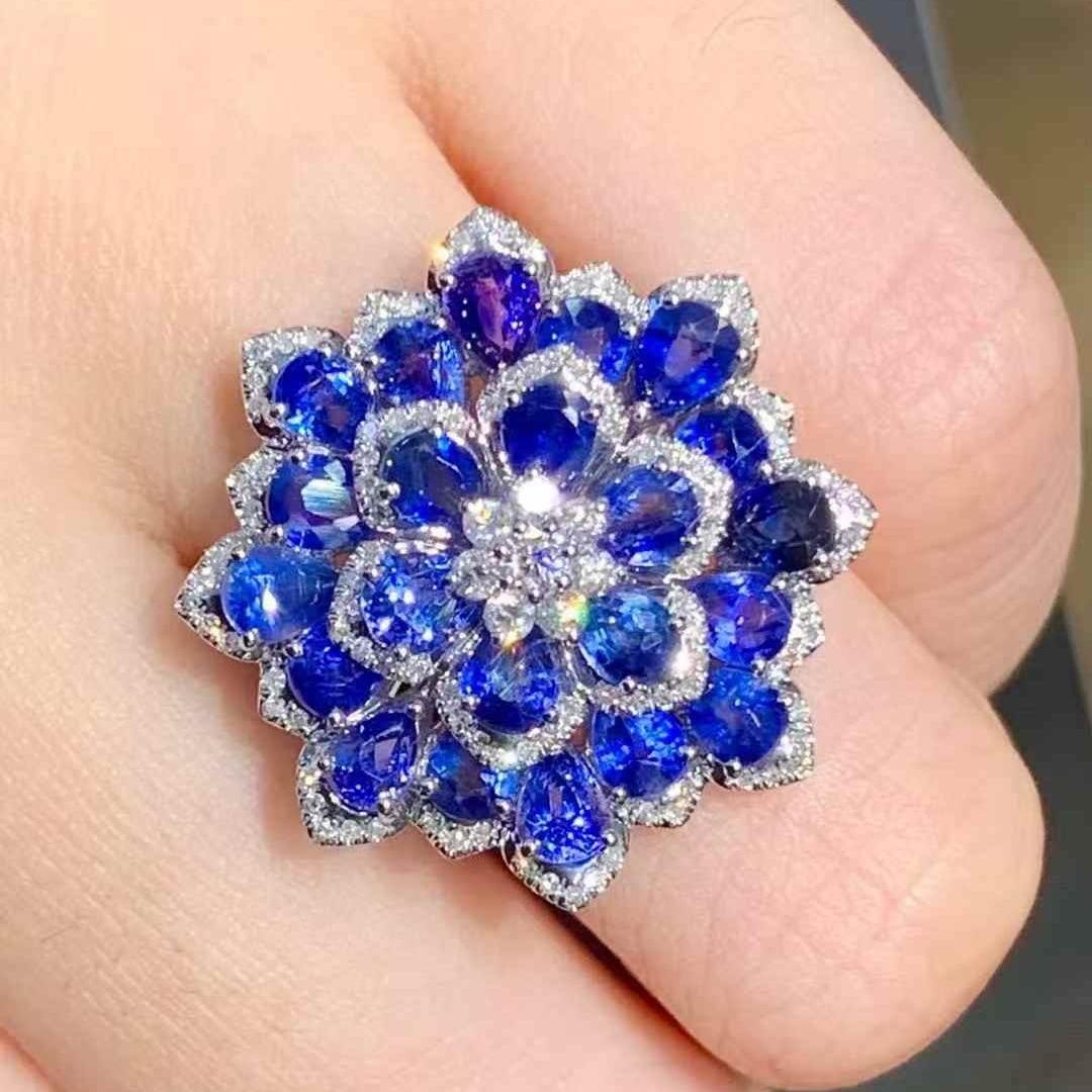 14k Gold 5.01 Ct Natural Sapphire & Diamond Ring: Ref:231119234 // gold content:14k gold // ring size:7. 25us // // main gemstone:sapphire // shape:pear // carat weight:5. 01ct // color:blue // treatment:natural // // adjacent gemstone 2 :