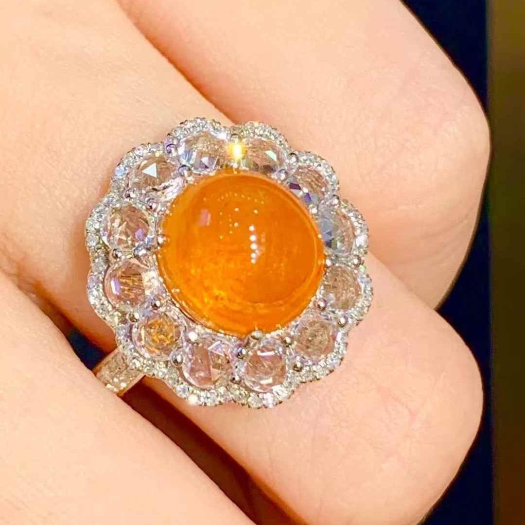 14k Gold 5.6 Ct Natural Spessartine & Diamond Ring: Ref:231119259 // gold content:14k gold // ring size:7. 25us // // main gemstone:spessartine // shape:oval // carat weight:5. 6ct // color:orange // treatment:natural // // adjacent gemstone 2 :