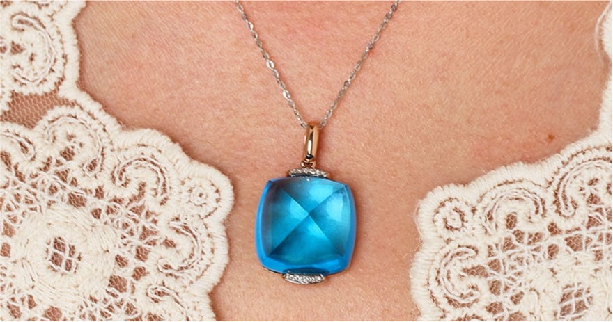 14k Gold 29.12 Ct Natural Topaz & Diamond Pendant( Without Chain ): Ref:231120015 // gold content:14k gold // main gemstone:topaz // shape:sugar-loaf // carat weight:29. 12ct // color:blue // treatment:natural // // adjacent gemstone 2 : diamond // shape:round // clar