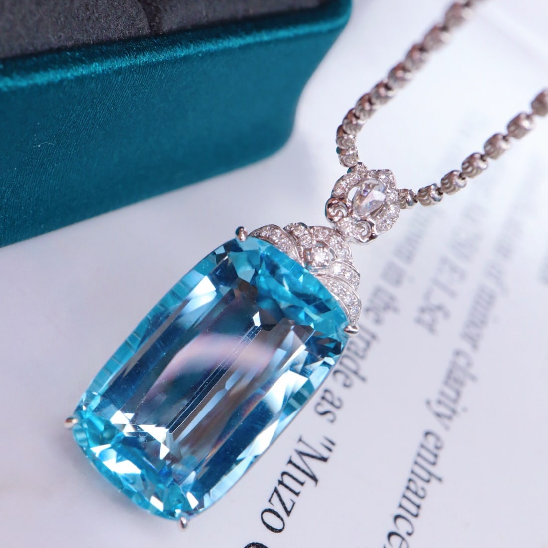 14k Gold 10.42 Ctw Natural Aquamarine & Diamond Pendant( Without Chain ): Ref:231120052 // gold content:14k gold // main gemstone:aquamarine // shape:cushion // carat weight:10. 28ct // color:santa maria color // treatment:natural // // adjacent gemstone 2 : diamond //