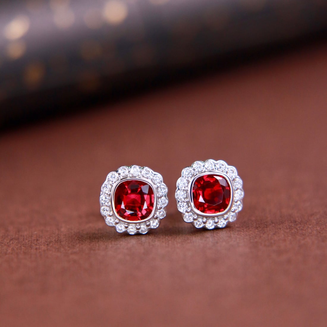 14k Gold 1.29 Ctw Vivid Red Natural Ruby & Diamond Earrings: Ref:231120099 // gold content:14k gold // main gemstone:ruby // shape:cushion // carat weight:1. 0ct // color:vivid red // treatment:natural // // adjacent gemstone 2 : diamond // shape:round //