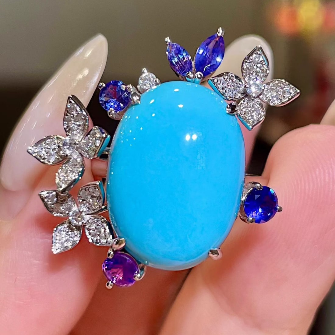 14k Gold 11.95 Ctw Natural Blue Turquoise & Sapphire Ring: Ref:231120130 // gold content:14k gold // ring size:7. 25us // // main gemstone:blue turquoise // shape:oval // carat weight:11. 10ct // color:blue // treatment:natural // // adjacent gemstone 2 :