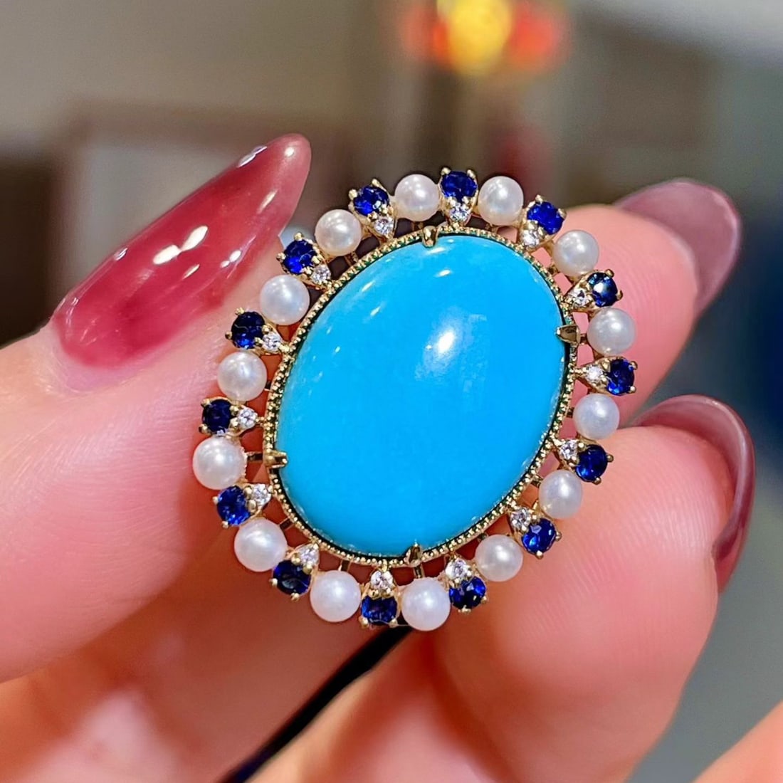 14k Gold 6.80 Ctw Natural Blue Turquoise & Sapphire Ring: Ref:231120175 // gold content:14k gold // ring size:7. 25us // // main gemstone:blue turquoise // shape:oval // carat weight:6. 43ct // color:blue // treatment:natural // // adjacent gemstone 2 :