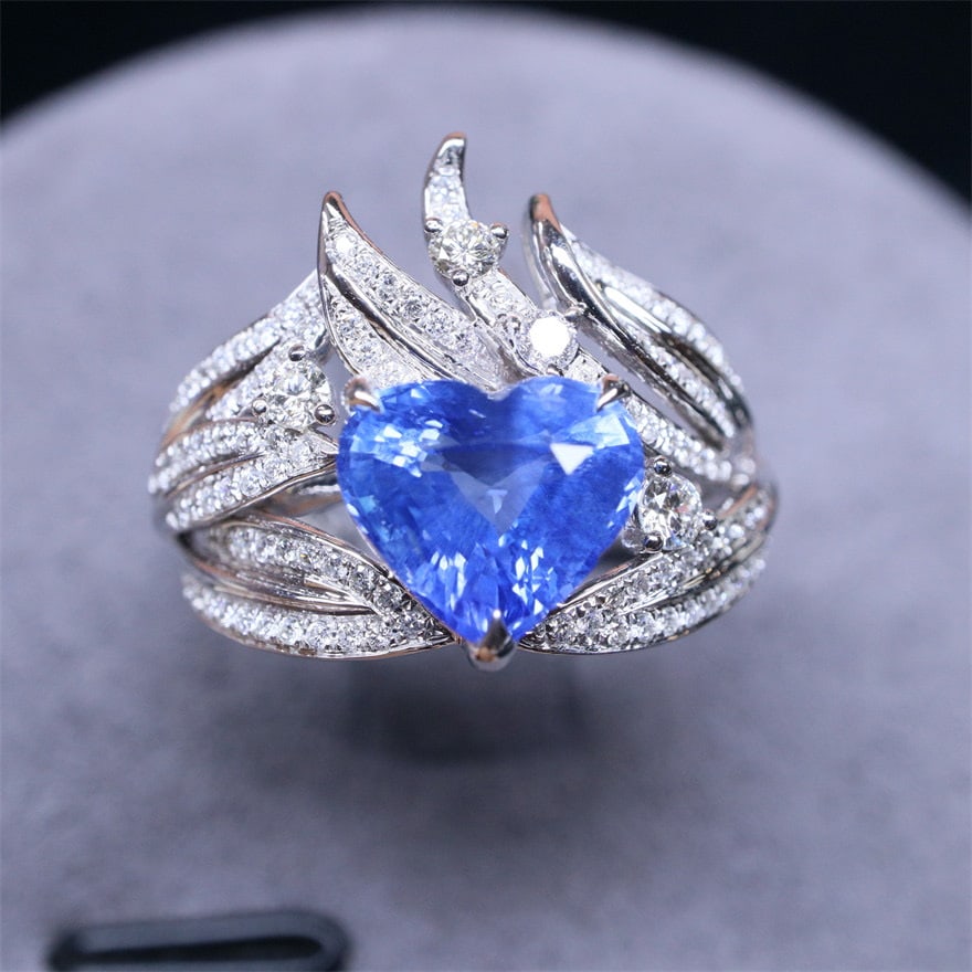 14k Gold 2.53 Ctw Natural Sapphire & Diamond Ring: Ref:231120261 // gold content:14k gold // ring size:7. 25us // // main gemstone:sapphire // shape:heart // carat weight:2. 19ct // color:blue // treatment:natural // // adjacent gemstone 2 :