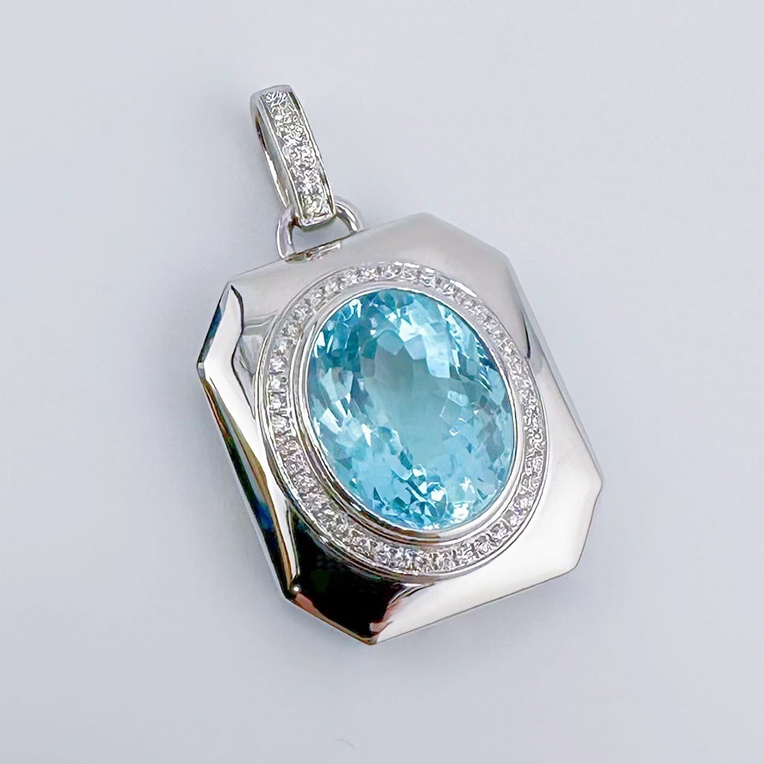 14k Gold 7.67 Ctw Natural Aquamarine & Diamond Pendant( Without Chain ): Ref:231120273 // gold content:14k gold // main gemstone:aquamarine // shape:oval // carat weight:7. 40ct // color:santa maria color // treatment:natural // // adjacent gemstone 2 : diamond //