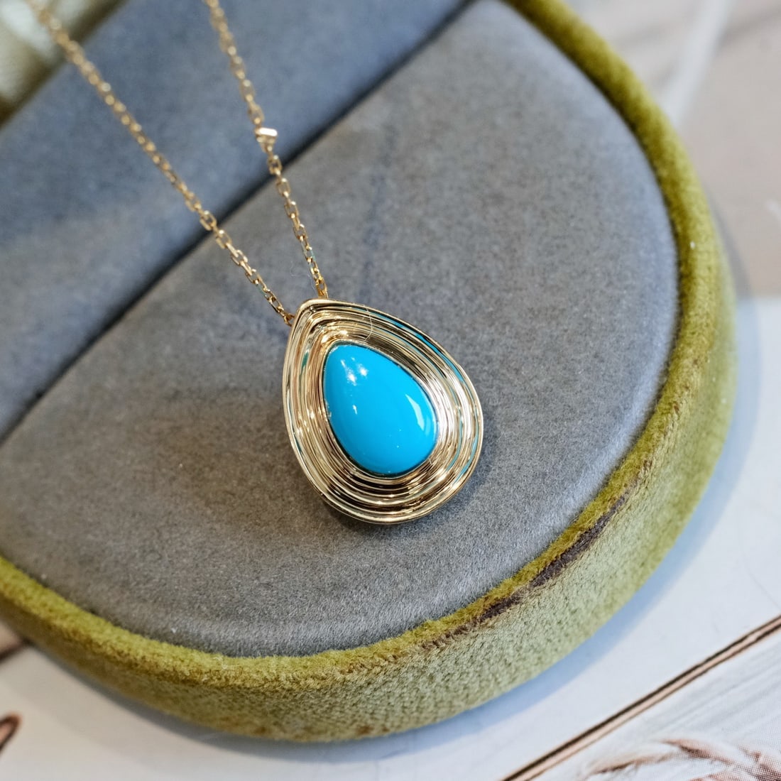 14k Gold 1.35 Ct Natural Blue Turquoise Pendant( Without Chain ): Ref:231120308 // gold content:14k gold // main gemstone:blue turquoise // shape:pear // carat weight:1. 35ct // color:blue // treatment:natural // Condition: NewLow Estimate: 1700.00High Estimate: