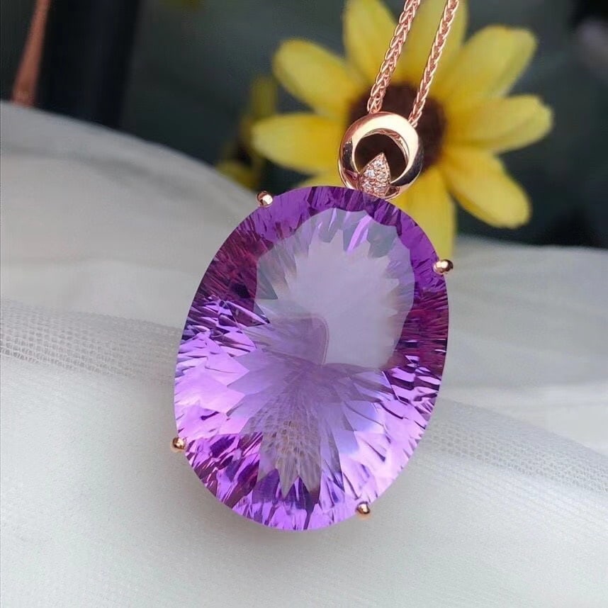 14k Gold 44.70 Ct Natural Amethyst & Diamond Pendant( Without Chain ): Ref:231120347 // gold content:14k gold // main gemstone:amethyst // shape:oval // carat weight:44. 70ct // color:purple // treatment:natural // // adjacent gemstone 2 : diamond // number of stones:5 /