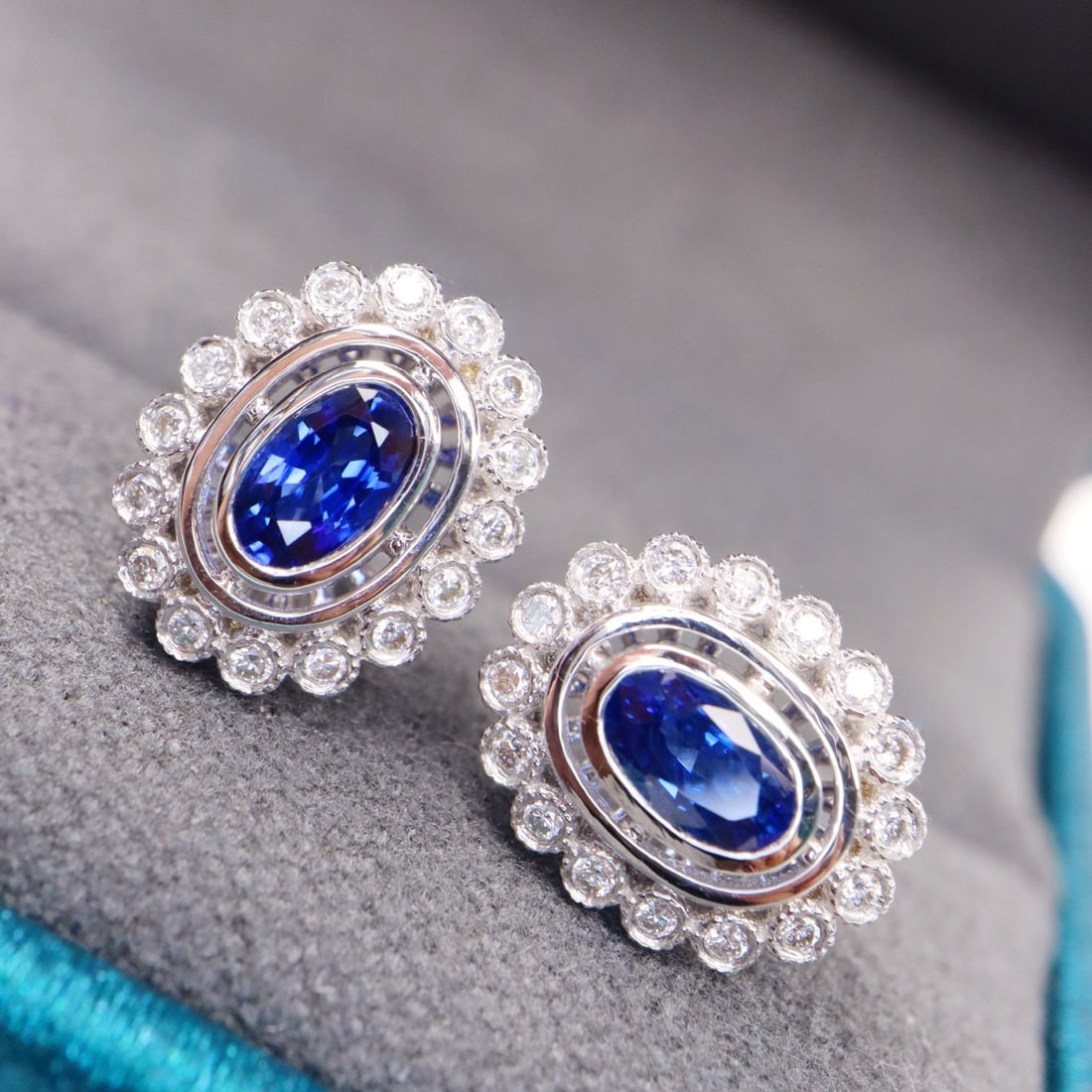 14k Gold 1.29 Ctw Natural Sapphire & Diamond Earrings: Ref:231120354 // gold content:14k gold // main gemstone:sapphire // shape:oval // carat weight:1. 13ct // color:blue // treatment:natural // // adjacent gemstone 2 : diamond // shape:round // carat