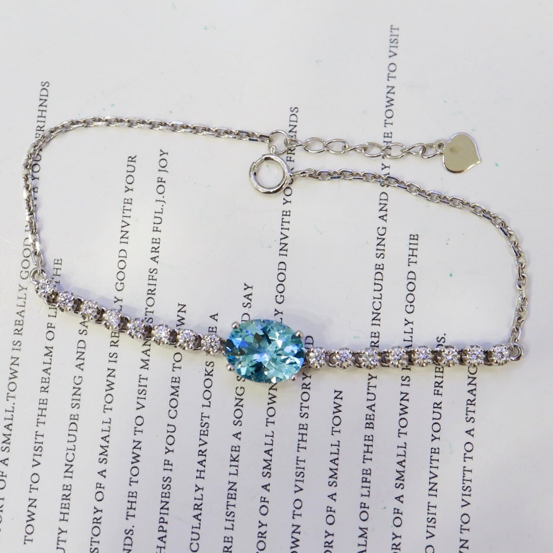 14k Gold 1.98 Ctw Natural Aquamarine & Diamond Bracelet: Ref:231120368 // gold content:14k gold // main gemstone:aquamarine // shape:oval // carat weight:1. 68ct // color:blue // treatment:natural // // adjacent gemstone 2 : diamond // shape:round //